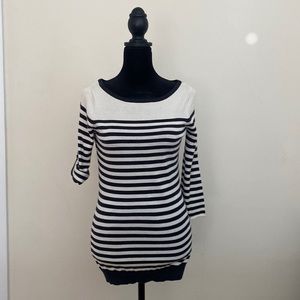 Black and white horizontally lined sweater. Sleeve can be rolled or left down.